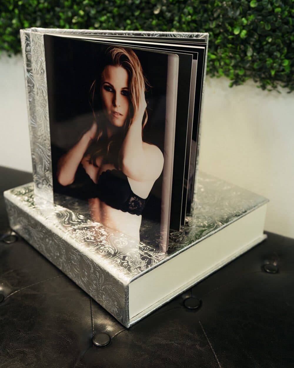A silver Nice Boudie album standing on its box